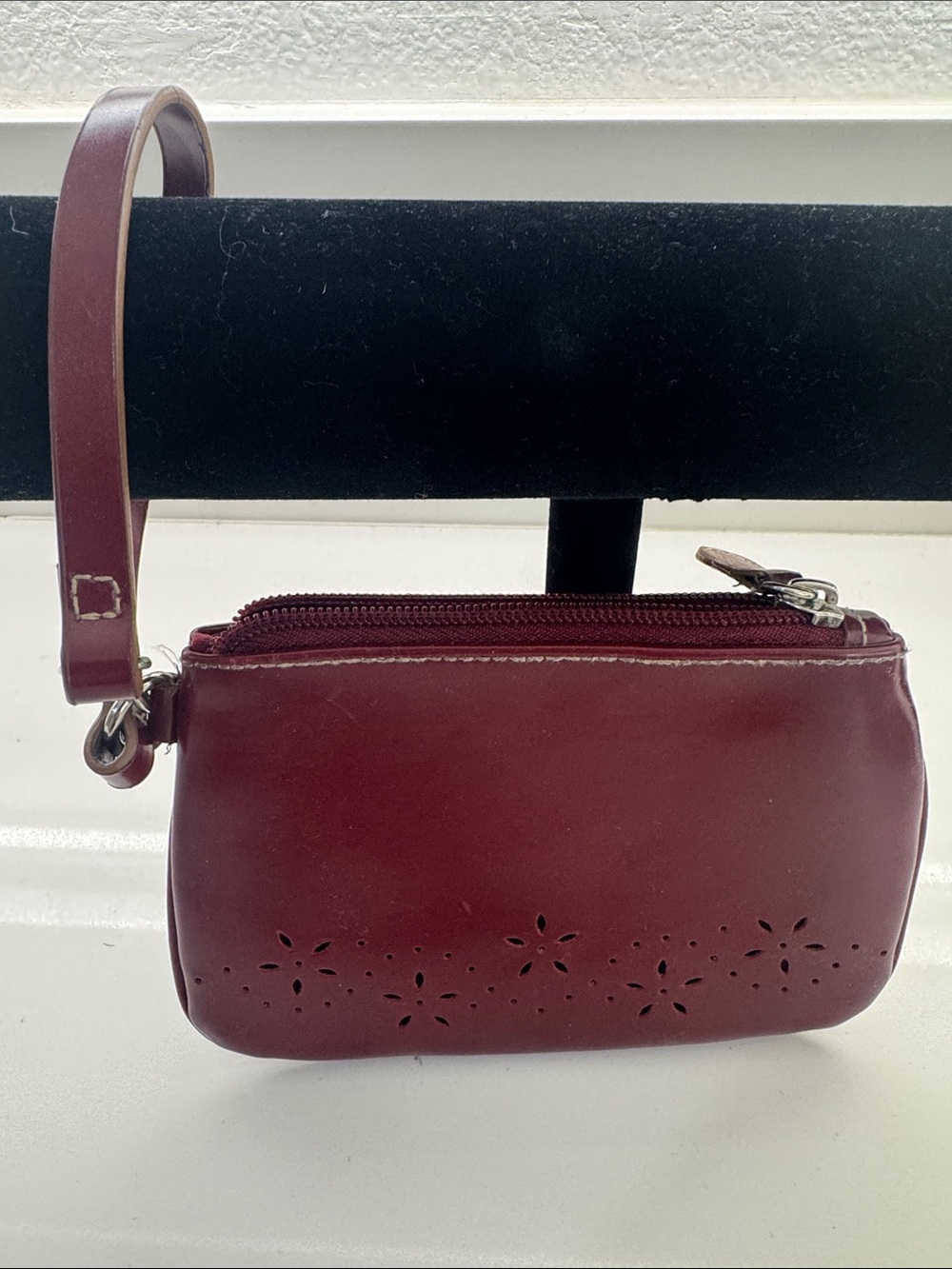 Source Unknown Burgundy Leather Wristlet Clutch with Floral Cutouts